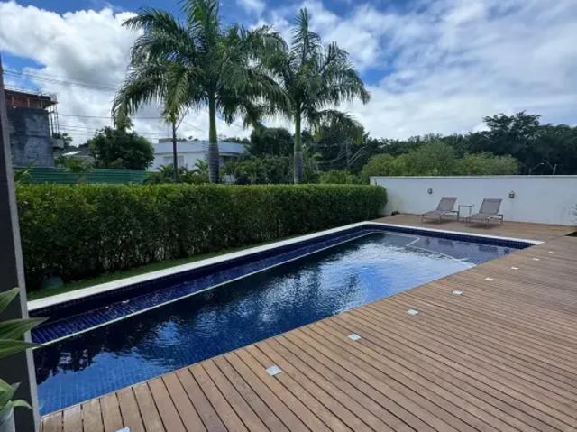 Casa a venda em alphaville litoral 1 com 5 suites mobiliada