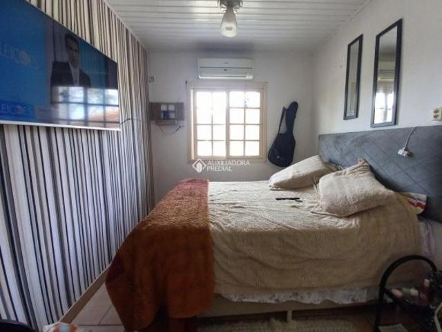 Casa à venda em Guaíba, com 3 quartos e 3 banheiros