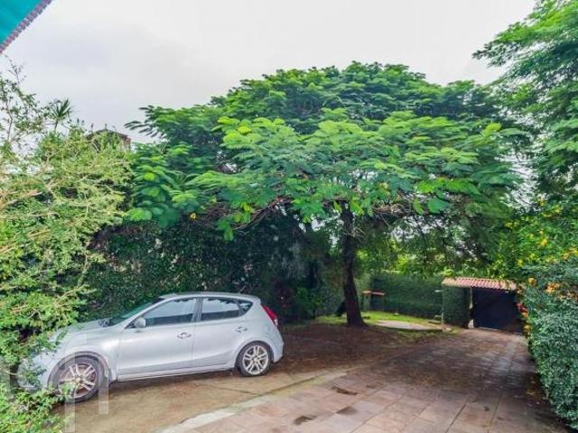 Casa à venda em Guarujá com 400 m², 5 quartos, 3 suítes, 5 vagas