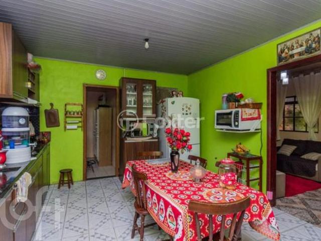 Casa à venda em Lomba do Pinheiro com 180 m², 3 quartos, 1 suíte, 2 vagas