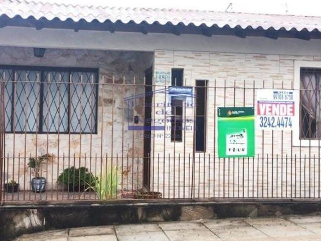 Casa à venda em Porto Alegre RS, bairro Vila Nova: 2 quartos, sala, banheiro, garagem. aceita financ