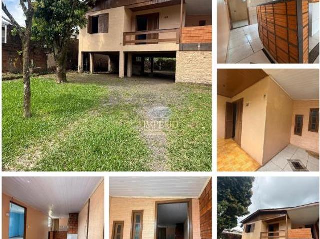 Casa à venda em Três Coroas RS, bairro Eucaliptos: 2 quartos, sala, banheiro, 2 vagas de garagem, 70