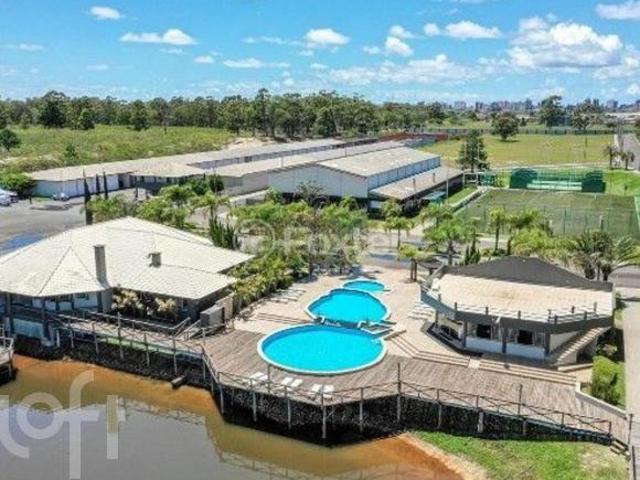 Casa à venda em Zona Nova com 225 m², 4 quartos, 4 suítes, 2 vagas