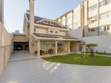 Casa à venda 4 suítes no Ahú!