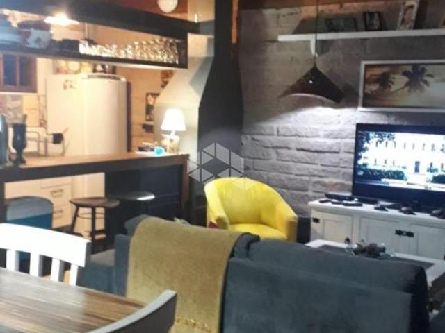 Casa à venda no bairro Noiva do Mar em Xangri Lá com 3 quartos 1 suíte