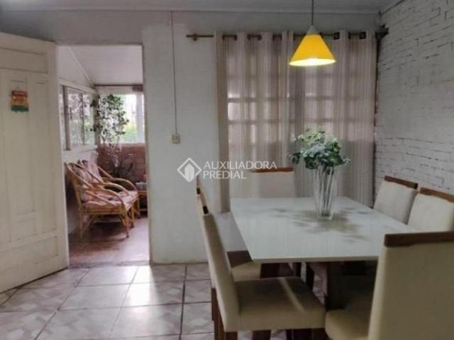 TERRENO COM DUAS CASAS A VENDA NO PARQUE MINUANO SARANDI