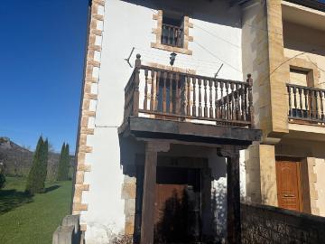 Casa adosada en Mollaneda
