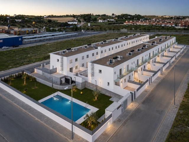 Casa adosada en venta en Coria del Río. Vivienda obra nueva en Coria del Río. Casas adosadas Coria del.