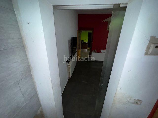 Casa adosada en venta en Anglès. Casa apareada con terraza lavadero 4 habitaciones y 3 baños en pleno centro de la población. Casas adosadas.