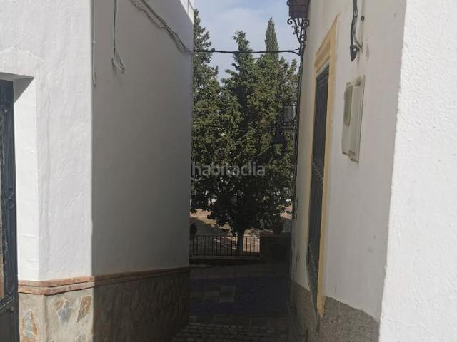 Casa adosada en venta en Iznájar. Magnificent Grand Townhouse with Lake Views, Plaza Location & Huge Potential. Casas adosadas.