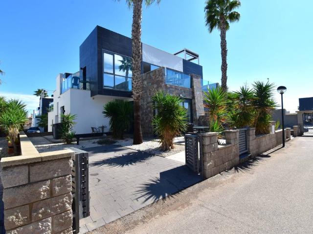 Casa adosada en Venta en Lomas de Cabo Roig Los Dolses
