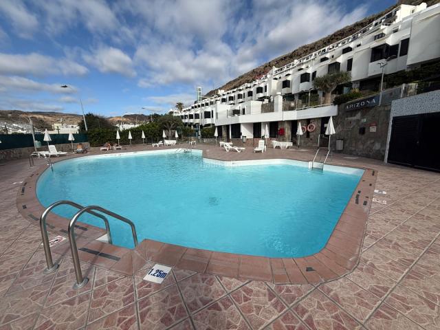 Casa adosada en venta en Mogán, Puerto Rico. Bungalow con vistas uso residencial. Casas adosadas.