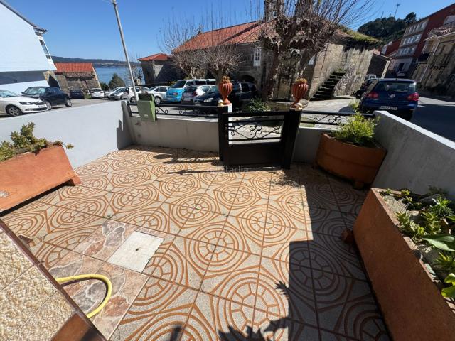 Casa adosada en venta en Muros. CASA HABITABLE EN CALLE VIRXEN CAMIÑO, AYUNTAMIENTO DE MUROS. Casas adosadas.