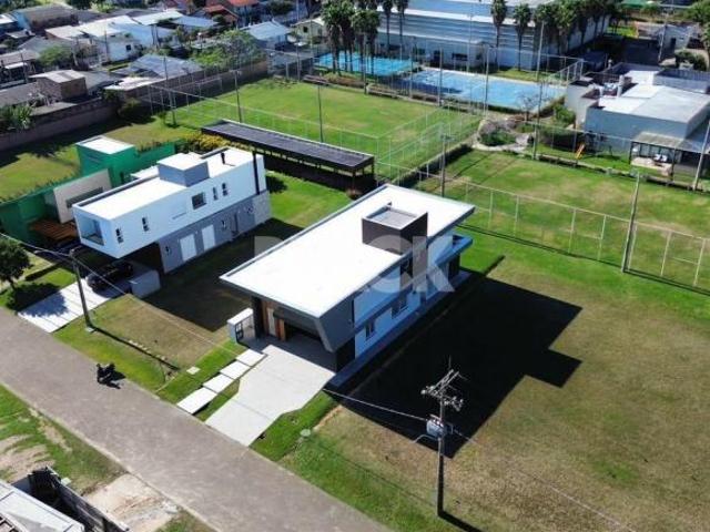 Casa alto padrão com 4 suítes no Ilhas Park em Torres RS