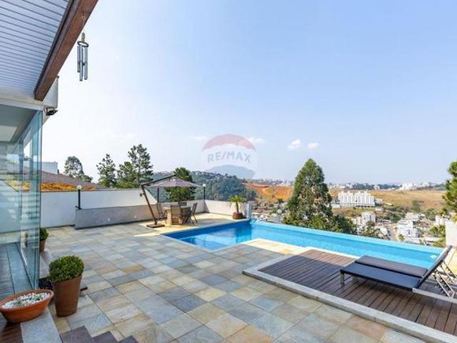 Casa Alto Padrão 3 quartos, 3 suítes, área gourmet com piscina borda infinita, 4 vagas, Condomínio S