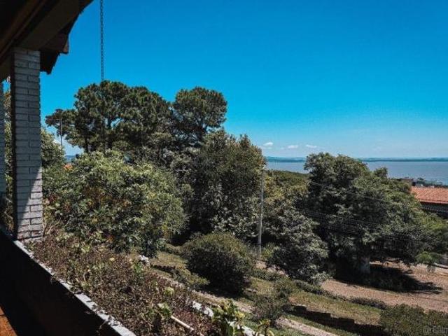 Casa bairro Sétimo Céu, 463m² privativos, vista privilegiada do Rio Guaíba em te