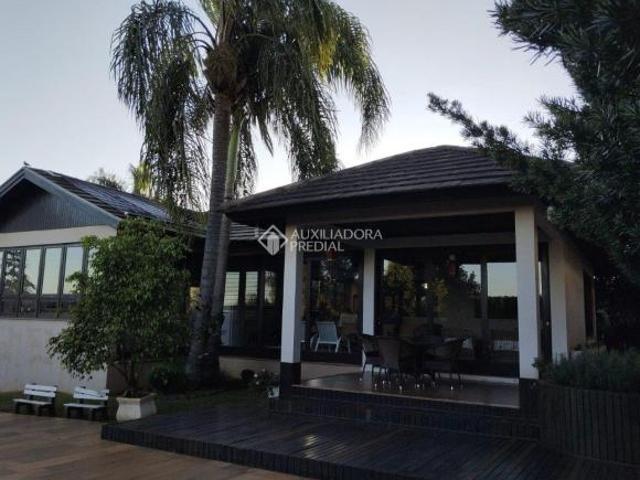 Casa com 4 dormitórios mobiliada, sendo 2 suítes e 5 banheiros em Santo Ângelo, 4 terrenos, poço art