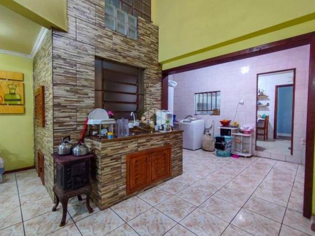 Casa com 4 dormitórios no Arroio Grande