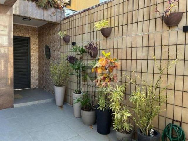 Casa com 4 dormitórios à venda, 127 m² por R$ 1.440.000,00 Ponta da Praia Santos/SP