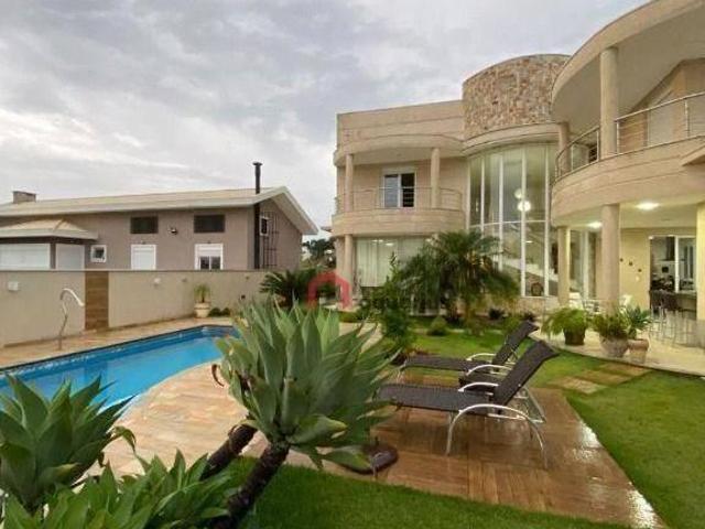 Casa com 4 dormitórios à venda, 450 m² por R$ 4.900.000,00 Condomínio Reserva do Paratehy São Jo
