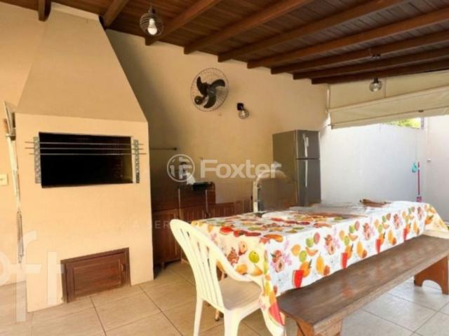 Casa com 4 dormitórios em Porto Alegre