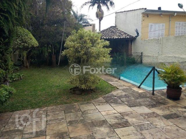 Casa com 4 dormitórios em Porto Alegre