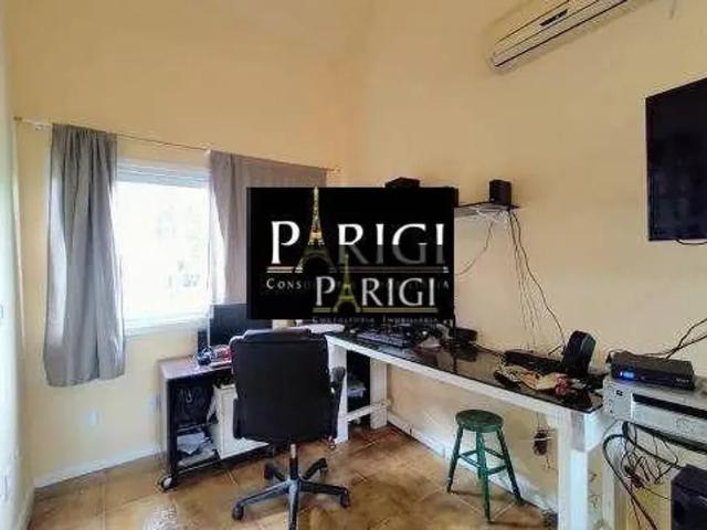 Casa com 4 dormitórios para alugar, 520 m² por R$ 9.106,00/mês Guarujá Porto Alegre/RS