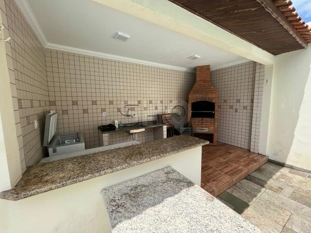 Casa com 4 dormitórios para locação, 320 m² por R$ 12.000,00 Acapulco Guarujá/SP
