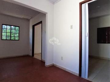 Casa com 4 dormitórios, pátio, 1 vaga de garagem no Bairro Jardim São Pedro, em Porto Alegre. Ótimo