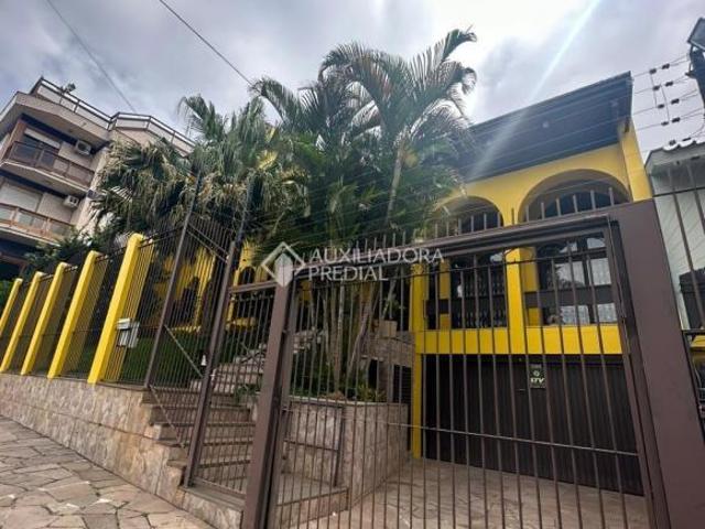 Casa com 4 quartos 4 suítes e 3 vagas à venda no bairro Jardim Lindóia em Porto Alegre