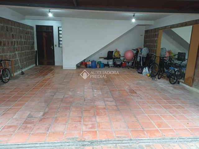 Casa com 4 quartos com 2 suítes no bairro Ipanema