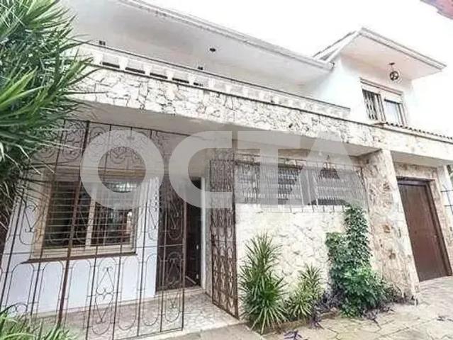 Casa com 4 quartos e 3 banheiros no bairro Três Figueiras