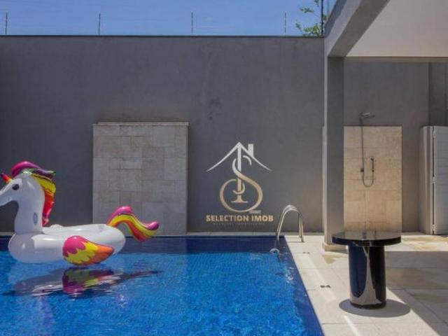 Casa com 4 suítes, Piscina aquecida climatização da piscina solar Mini quadra poliesportiva, Espa