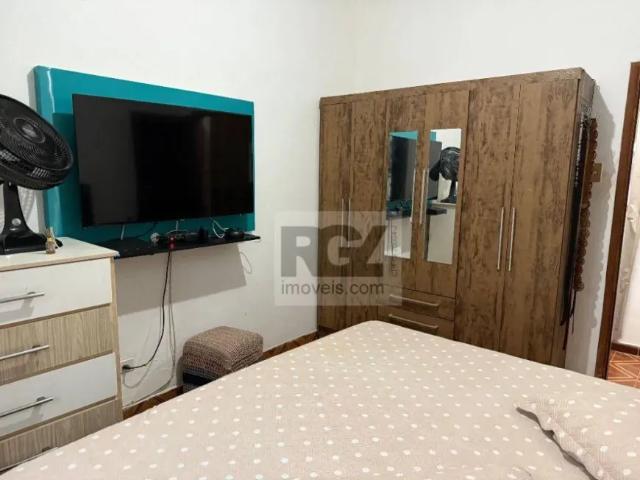 Casa com 5 dormitórios à venda, 150 m² por R$ 950.000,00 Estuário Santos/SP