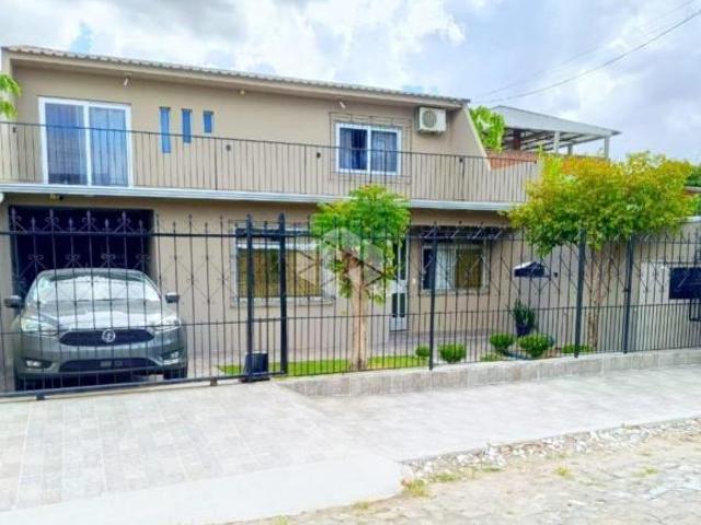 Casa com 5 quartos à venda no bairro Juscelino Kubitschek