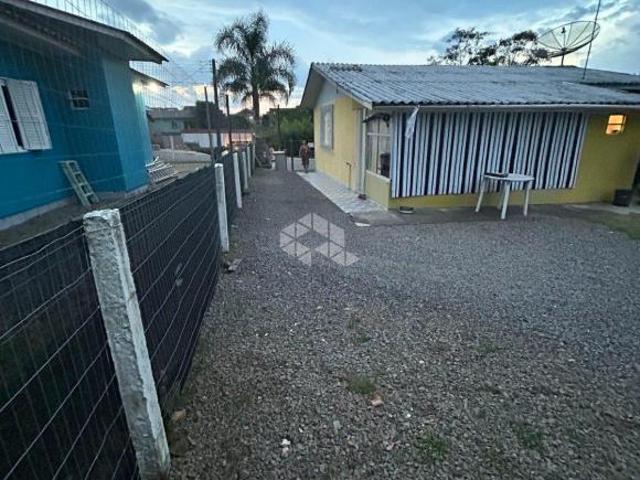 Casa com 69,75m² de área total, 3 quartos, 2 vagas de garagem no bairro Monte Verde