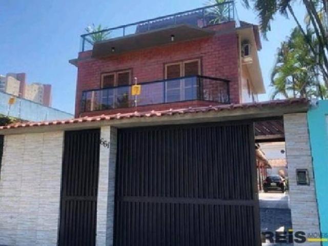 Casa com 7 dormitórios à venda, 390 m² por R$ 1.620.000,00 Jardim Três Marias Guarujá/SP