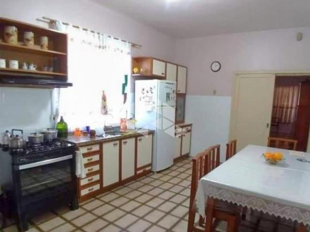 Casa com 03 dormitórios à venda no bairro Nossa Senhora do Perpétuo Socorro em Santa Maria, RS