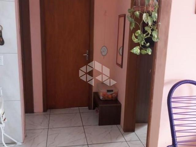 Casa com 03 dormitórios e 02 banheiros à venda no bairro Pé de Plátano em Santa Maria