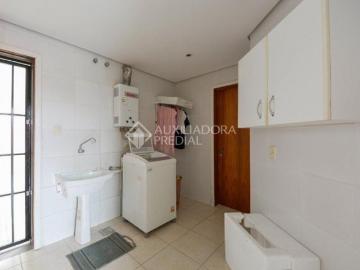 Casa com 04 dormitórios nos Bairros Santa Tereza e Menino Deus