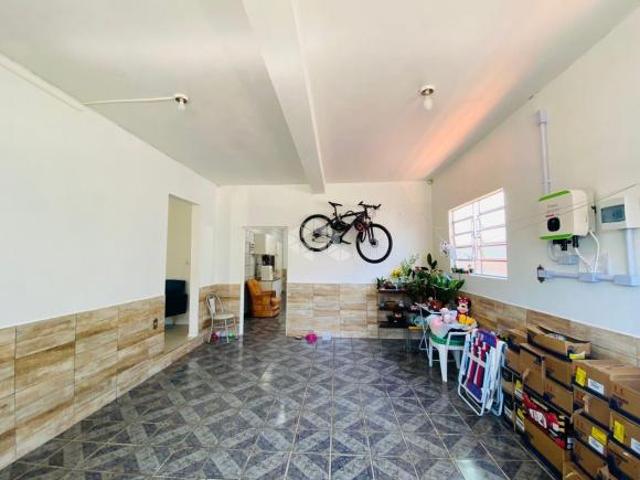 Casa com 04 quartos a venda no bairro Camobi, próximo a UFSM em Santa Maria
