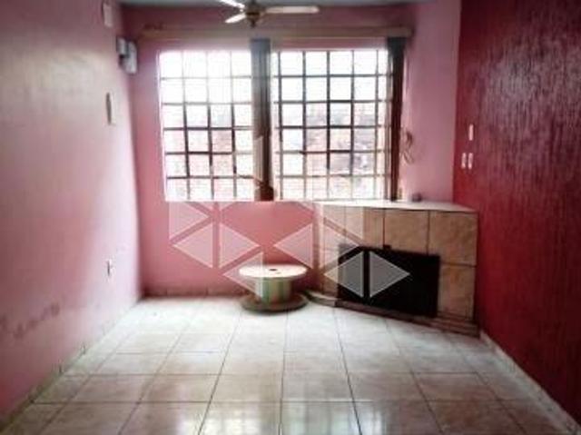 Casa com 05 quartos e churrasqueira, à venda no bairro Nossa Senhora do Rosário, em Santa Maria. RS