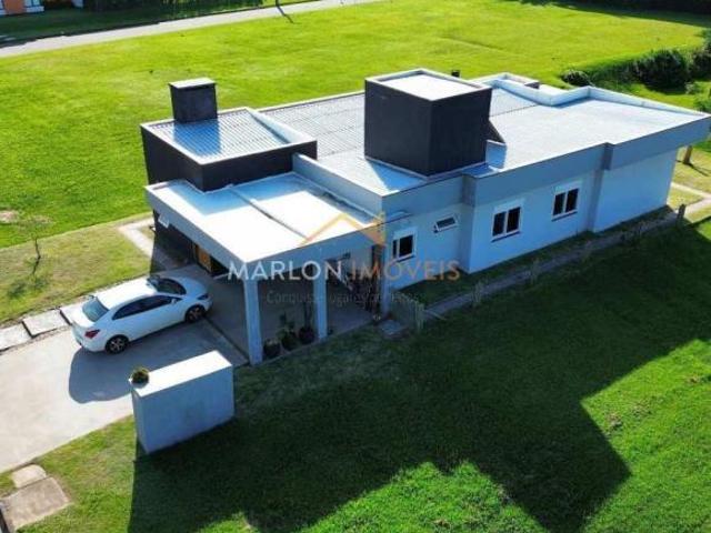 Casa com 215m² no Condomínio Reserva das Águas em Torres. Exclusiva condição de pagamento