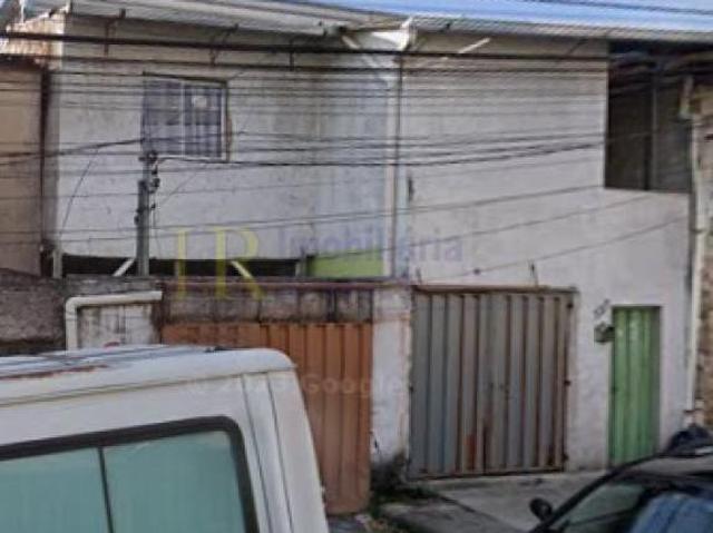 casa com 2 moradias