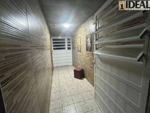Casa com 2 dormitórios à venda, 112 m² por R$ 360.000,00 Parque das Bandeiras São Vicente/SP