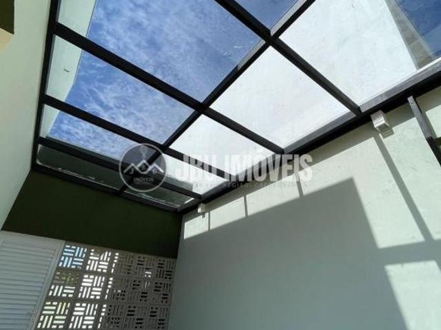 Casa com 2 dormitórios à venda, 121m² por R$ 880.000 – Condomínio Tropicalia Garden