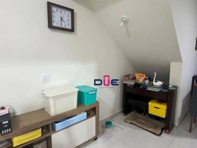 Casa com 2 dormitórios à venda, 135 m² por R$ 890.000 Aparecida Santos/SP