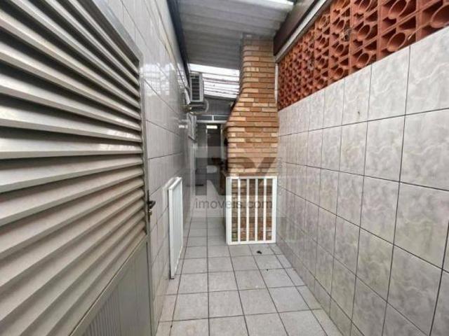 Casa com 2 dormitórios à venda, 142 m² por R$ 1.370.000,00 Ponta da Praia Santos/SP