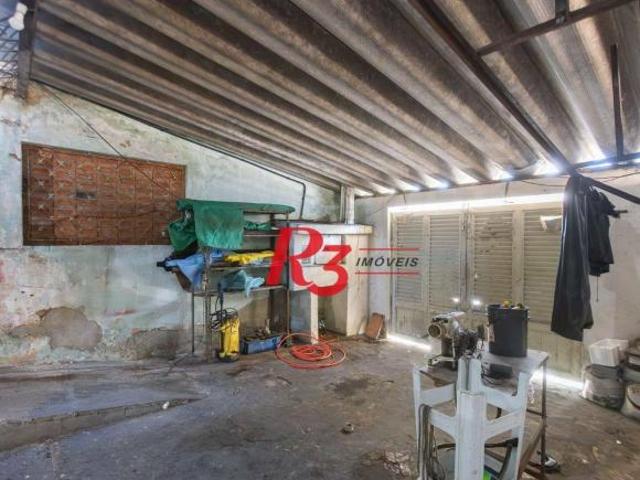 Casa com 2 dormitórios à venda, 157 m² por R$ 600.000,00 Estuário Santos/SP