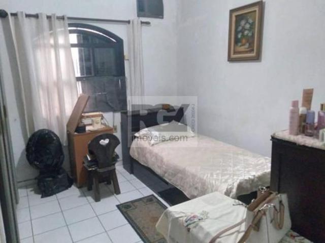 Casa com 2 dormitórios à venda, 195 m² por R$ 954.000,00 Ponta da Praia Santos/SP
